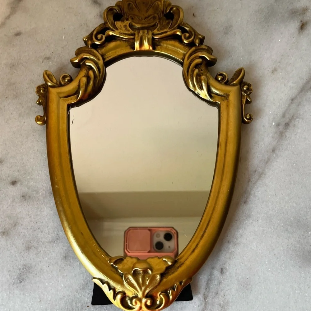 Ornate Gold and Black Decorative Mirror